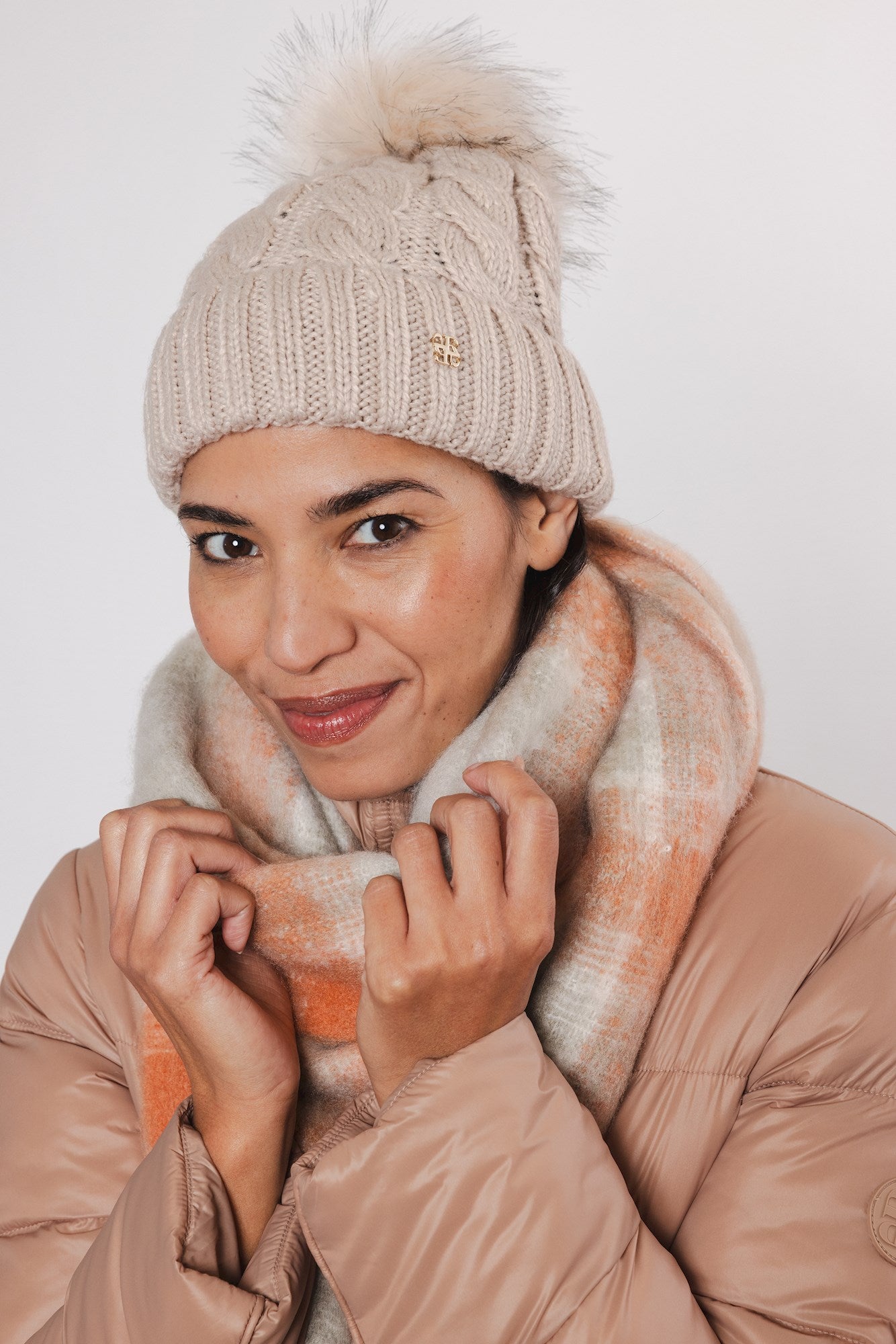 Rino & Pelle Cable Knit Pom Pom Beanie in Beige